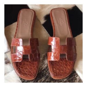 Hermes Oran Sandals In Orange Shiny Niloticus Crocodile