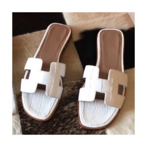 Hermes Oran Sandals In White Shiny Niloticus Crocodile