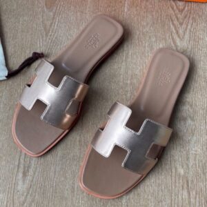 Hermes Oran Slide Sandals in Rose Gold Metallic Leather